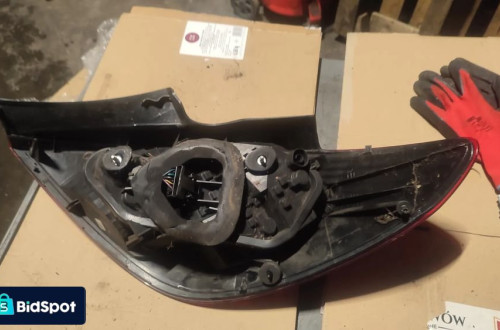 Lampa lewy tył  Opel Corsa D 10' hb 5 drzwi