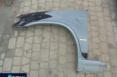 BŁOTNIK LEWY BMW X5 99-06