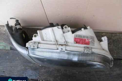 Lampa prawa VOLVO V40 S40 LIFT + KIERUNEK HELLA EUROPA