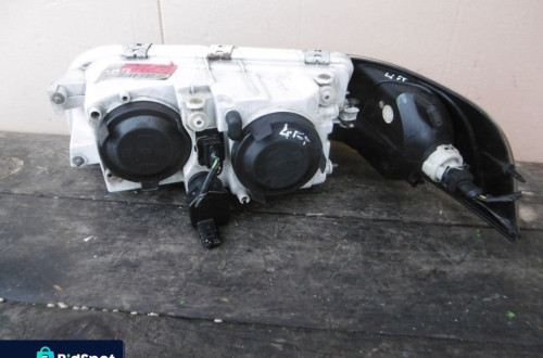 Lampa prawa VOLVO V40 S40 LIFT + KIERUNEK HELLA EUROPA