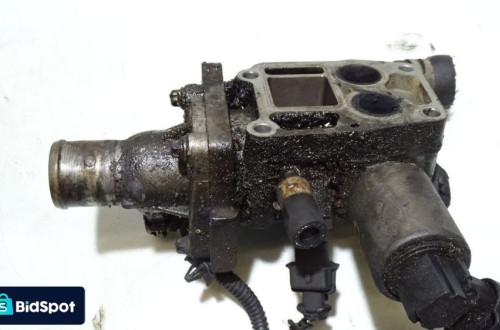 OBUDOWA TERMOSTATU OPEL ASTRA 1.6 24418432