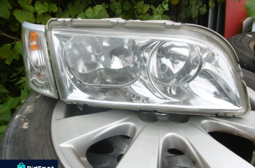 Lampa prawa VOLVO V40 S40 LIFT + KIERUNEK HELLA EUROPA