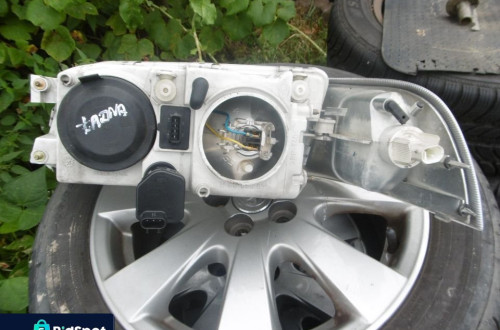 Lampa prawa VOLVO V40 S40 LIFT + KIERUNEK HELLA EUROPA