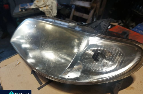 Reflektor lampa lewa przednia lewy przód Mazda 323 '01r Anglik