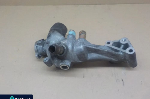 KIA CARNIVAL 2.9 OBUDOWA TERMOSTATU