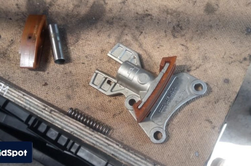 VW 2.0 TFSI NAPINACZ LANCUCHA ROZRZADU 06F109217A