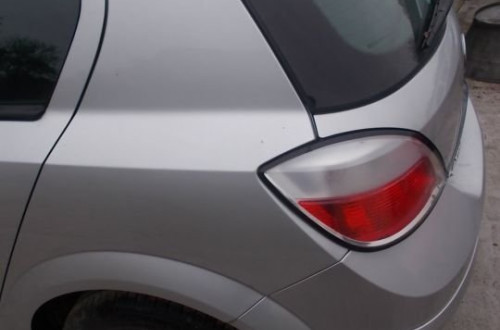 ZACISK TYLNY LEWY lub PERAWY  OPEL ASTRA III 3 H ZAFIRA B