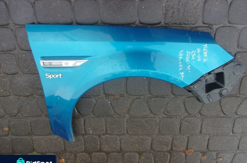 MIGACZ W BŁOTNIK PRAWY OPEL TIGRA B 04-09