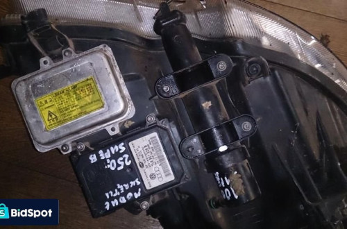 SPRYSKIWACZ REFLEKTORA SKODA SUPERB 08-13 LEWY