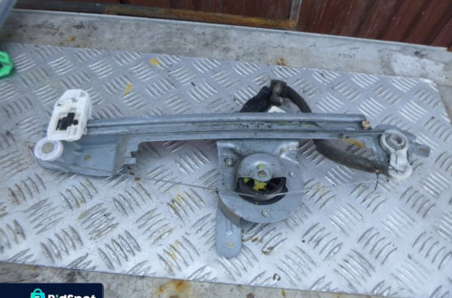RENAULT GRAND SCENIC II PODNOSNIK SZYB LEWY TYL