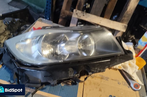 BMW E90 E91 Lampa prawa przednia  6942724 UK
