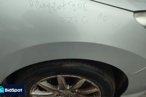 Błotnik prawy przód Peugeot 308 10&#x27; kod EZRC