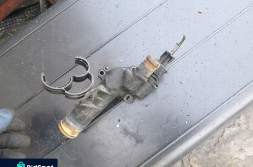 CLIO III 1.5 DCI OBUDOWA TERMOSTATU KROCIEC WODY