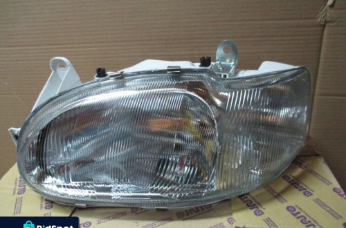 REFLEKTOR LEWY FORD ESCORT 95-99