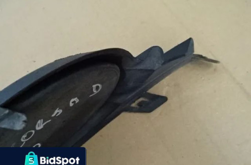KRATKA ZAŚLEPKA ZDERZAKA LEWA OPEL CORSA D NR9