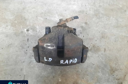 ZACISK LEWY PRZÓD PRZEDNI LEWY SKODA RAPID 1.6 TDI