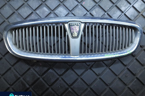 ROVER 25 ATRAPA GRILL 10004069701 ZNACZEK EMBLEMAT ORYGINAŁ