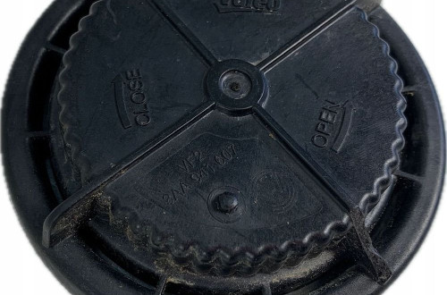 OPEL ZAŚLEPKA DEKIELEK REFLEKTORA LAMPY 90009172 89502908