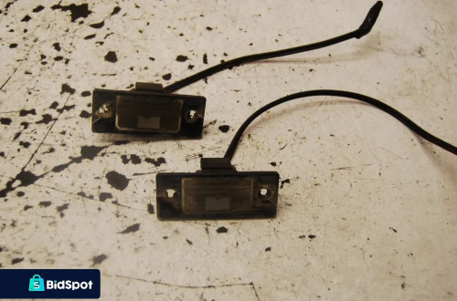 LAMPKA TABLICY REJESTRACYJNEJ 1J5943021A VW GOLF IV BORA PASSAT AUDI SKODA SEAT