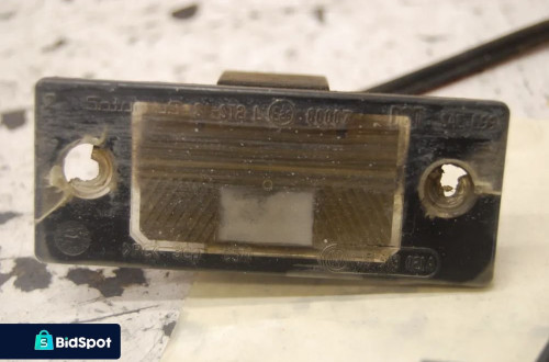 LAMPKA TABLICY REJESTRACYJNEJ 1J5943021A VW GOLF IV BORA PASSAT AUDI SKODA SEAT