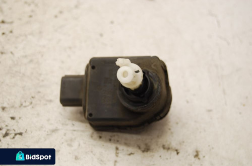 SILNICZEK REGULACJI LAMPY 0307852340 MAZDA 323 P