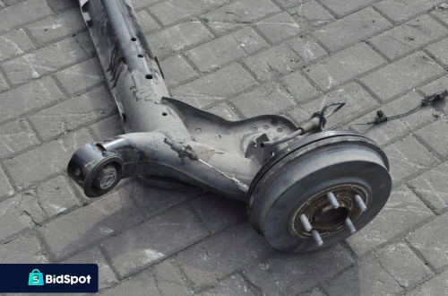 FORD PUMA MK2 1.0 ZAWIESZENIE BELKA TYŁ 22R BĘBNY