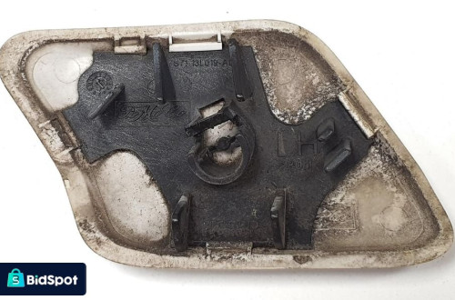 ZAŚLEPKA SPRYSKIWACZA LAMPY LEWA FORD MONDEO MK4
