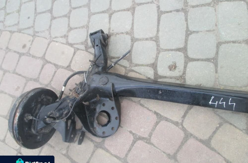 Oś belka zawieszenia tył TOYOTA YARIS II III ORGINAŁ bez rdzy