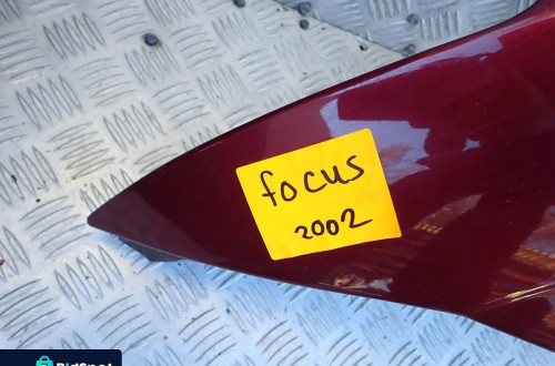 BŁOTNIK LEWY PRZOD FORD FOCUS I