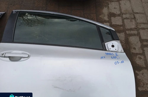 KLAMKA DRZWI TOYOTA YARIS II 05-11 PRAWA LUB LEWA PRZEDNIA
