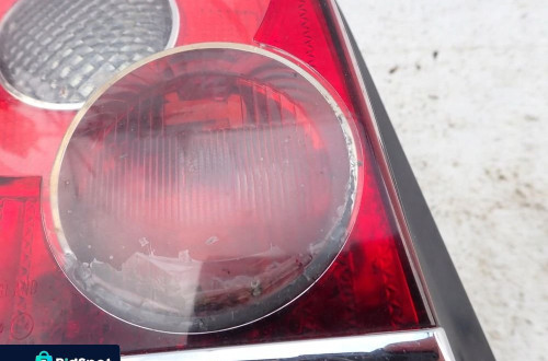 TOYOTA AVENSIS II 2 T25 KOMBI LIFT 06-09 LAMPA TYŁ TYLNA LEWA