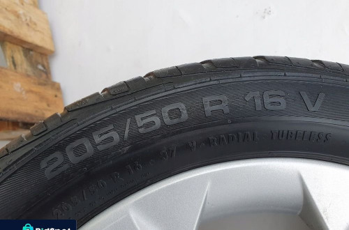 Opel Astra II G FELGI ALUMINIOWE Z OPONAMI 16 R16