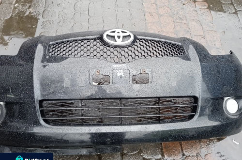 ZDERZAK PRZEDNI TOYOTA YARIS II 06-09 KOD KOLORU 209