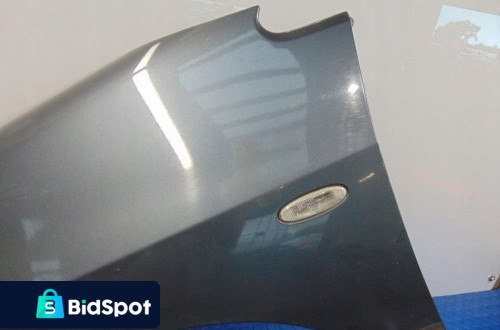 SUZUKI LIANA BŁOTNIK LEWY