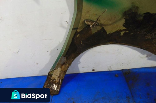 SUZUKI LIANA BŁOTNIK LEWY HB5