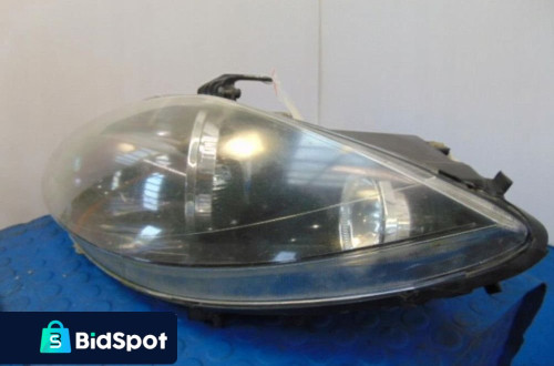 SEAT LEON II REFLEKTOR LEWY