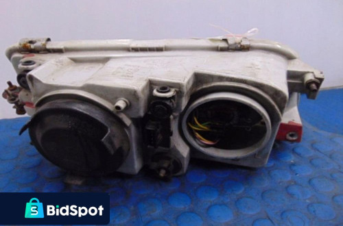 VOLVO V40 I REFLEKTOR LEWY