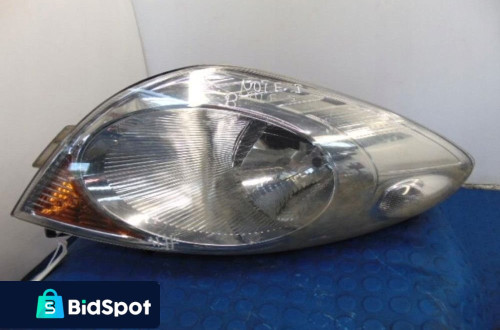 NISSAN NOTE I REFLEKTOR PRAWY 89902135