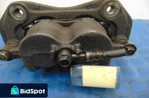 KIA SPORTAGE IV ZACISK LEWY PRZÓD