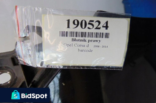 OPEL CORSA D BŁOTNIK PRAWY