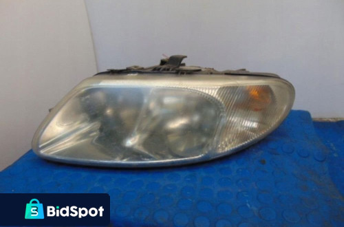 CHRYSLER VOYAGER III REFLEKTOR LEWY