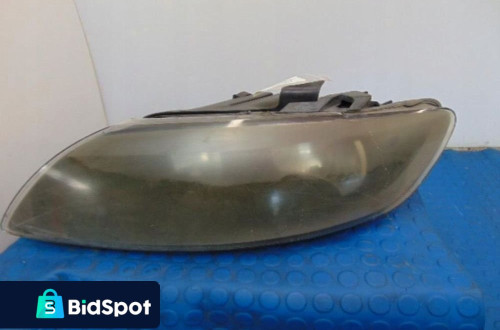 AUDI Q7 REFLEKTOR LEWY UK 4L0941003