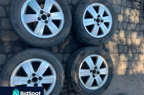 KOMPLET KOŁ ALUMINIOWYCH Z OPONAMI KOŁA TOYOTA COROLLA E11 E12 YARIS II 15 ET45 4x100 195/60 R15