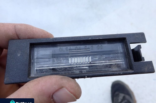 OPEL CORSA D 06- LAMPKA TABLICY REJESTRACYJNEJ