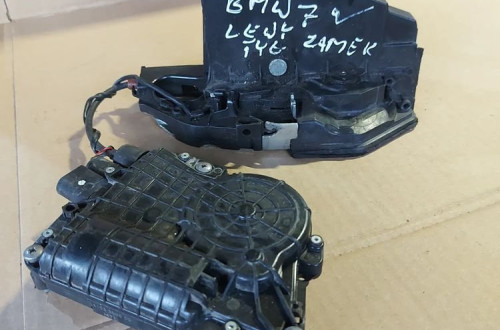Zamek drzwi lewy tył z dociągiem BMW7 7185687